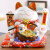 板谷波山招财猫开业店店店のカウターに并べられています。ギフトレーン陶磁器の贮金箱が家の装饰の大きなサズに変换されました。